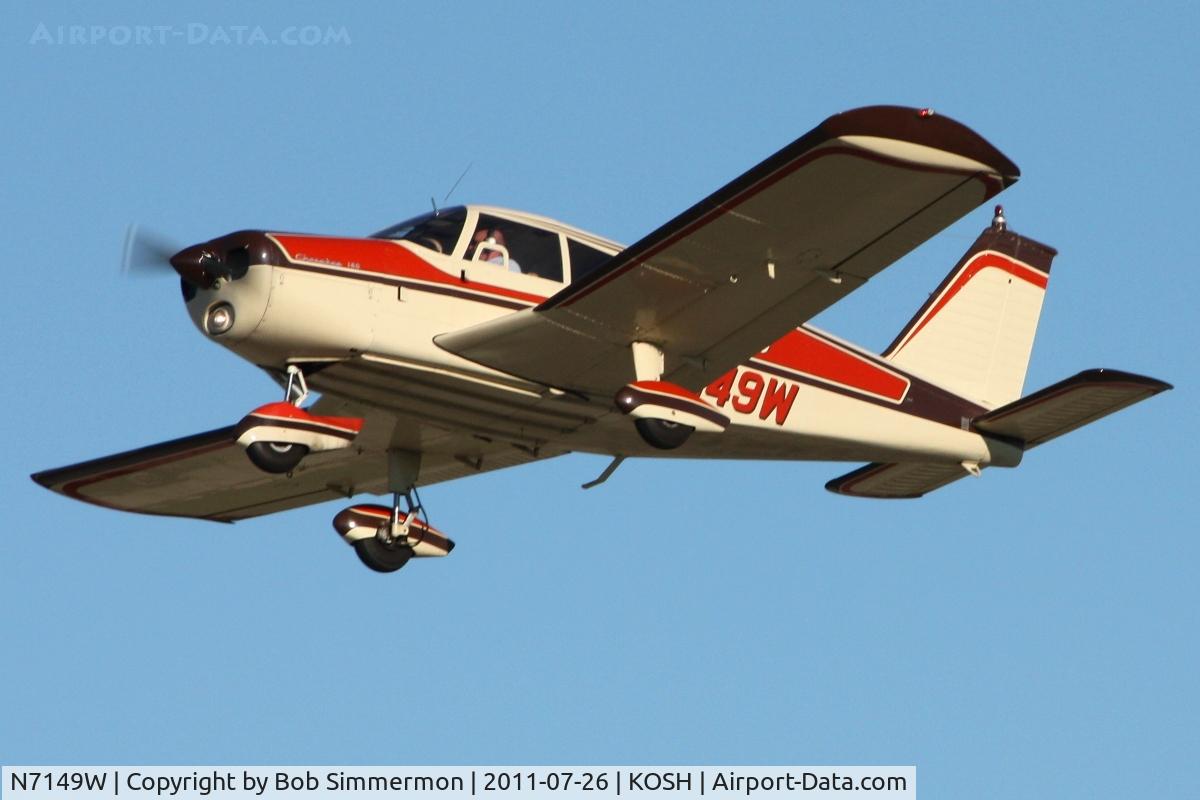 N7149W, 1962 Piper PA-28-180 Cherokee C/N 28-957, Departing Airventure 2011.