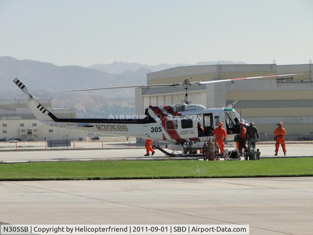 N305SB, 1969 Bell UH-1H-BF Iroquois C/N 11527, Fire fighting crew and ship's crew exiting