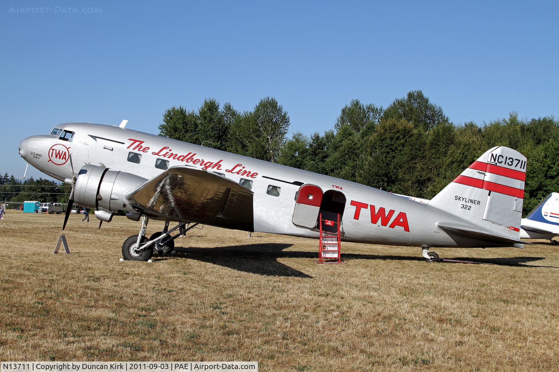 N13711, 1935 Douglas DC-2-118B C/N 1368, This TWA-schemed DC-2 was parked next to a United Airlines Boeing 247. Wonder if this happened 75 years ago?!