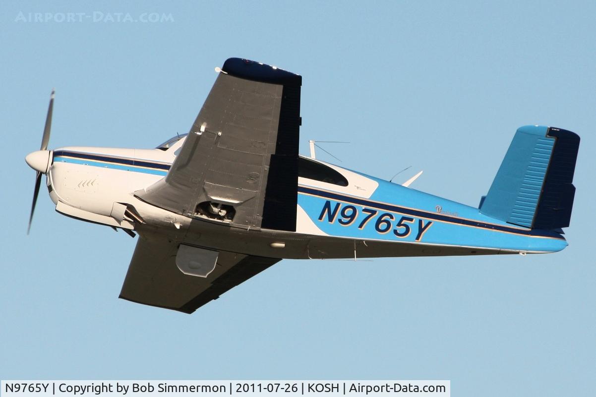 N9765Y, 1963 Beech P35 Bonanza C/N D-7151, Departing Airventure 2011.