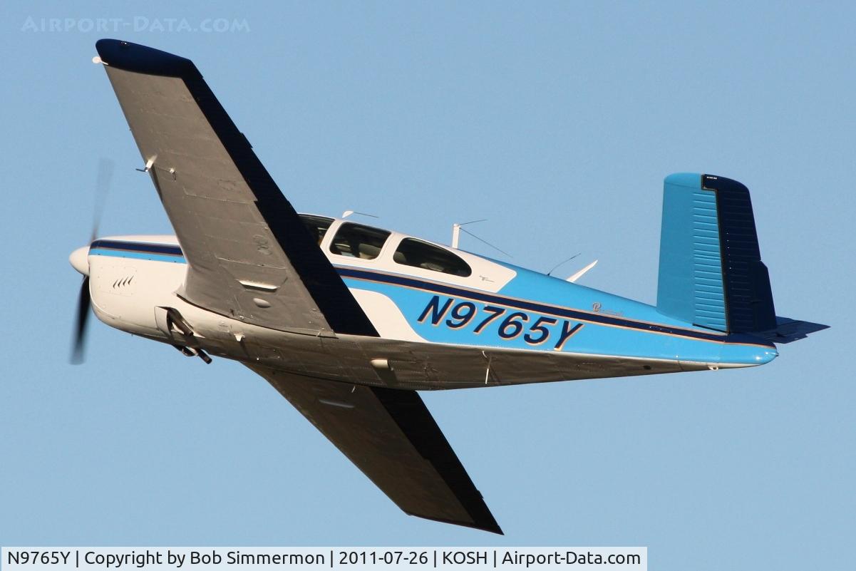 N9765Y, 1963 Beech P35 Bonanza C/N D-7151, Departing Airventure 2011.