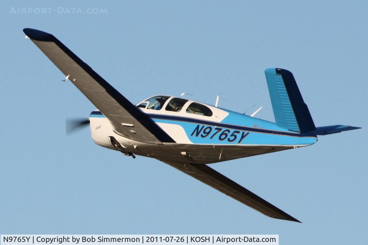 N9765Y, 1963 Beech P35 Bonanza C/N D-7151, Departing Airventure 2011.