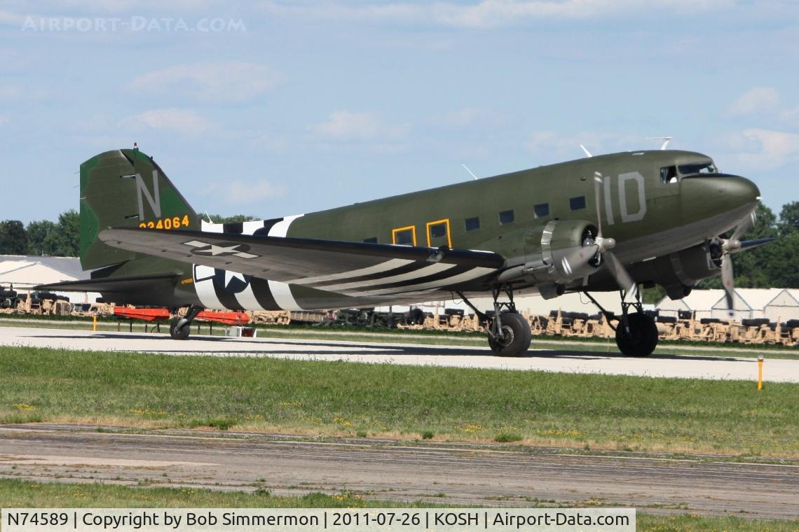 N74589, 1943 Douglas DC3C-S1C3G (C-47A) C/N 9926, Departing RWY 18 during Airventure 2011.