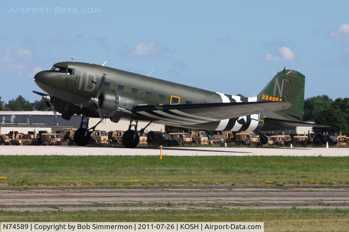 N74589, 1943 Douglas DC3C-S1C3G (C-47A) C/N 9926, Landing RWY 36 during Airventure 2011.