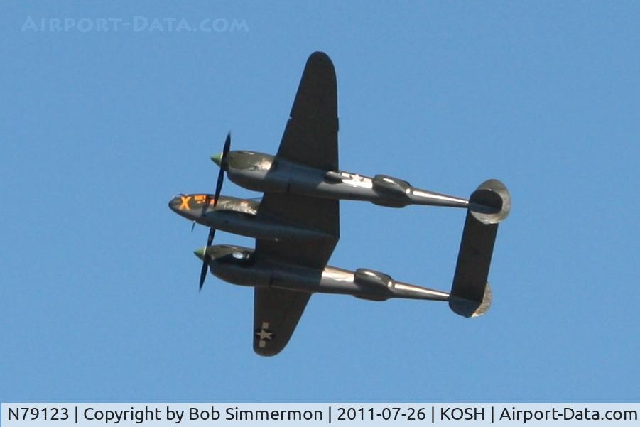 N79123, 1945 Lockheed P-38L-5 Lightning C/N 422-8235, Overflying Airventure 2011.