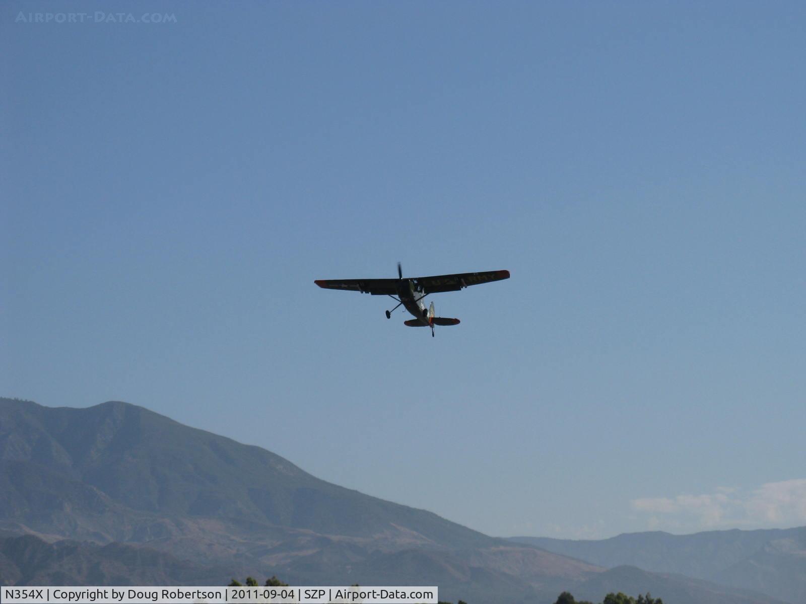 N354X, 1957 Cessna L-19E Bird Dog C/N 24512, 1957 Cessna L-19E BIRD DOG,  Continental O-470-11B 213 Hp, STOL takeoff climb Rwy 22, flaps used.