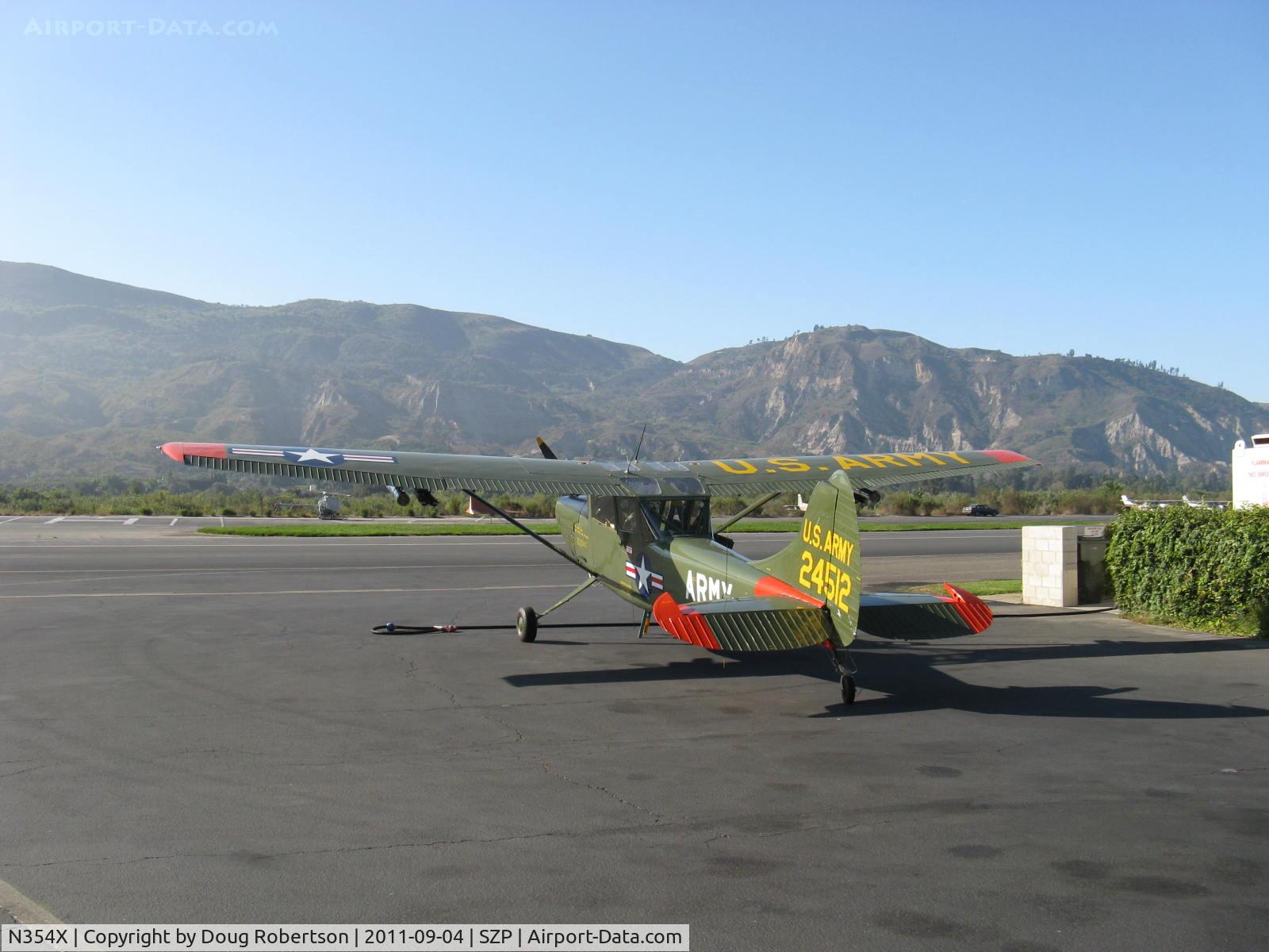 N354X, 1957 Cessna L-19E Bird Dog C/N 24512, 1957 Cessna L-19E BIRD DOG, Continental O-470-11B 213 Hp, refueling