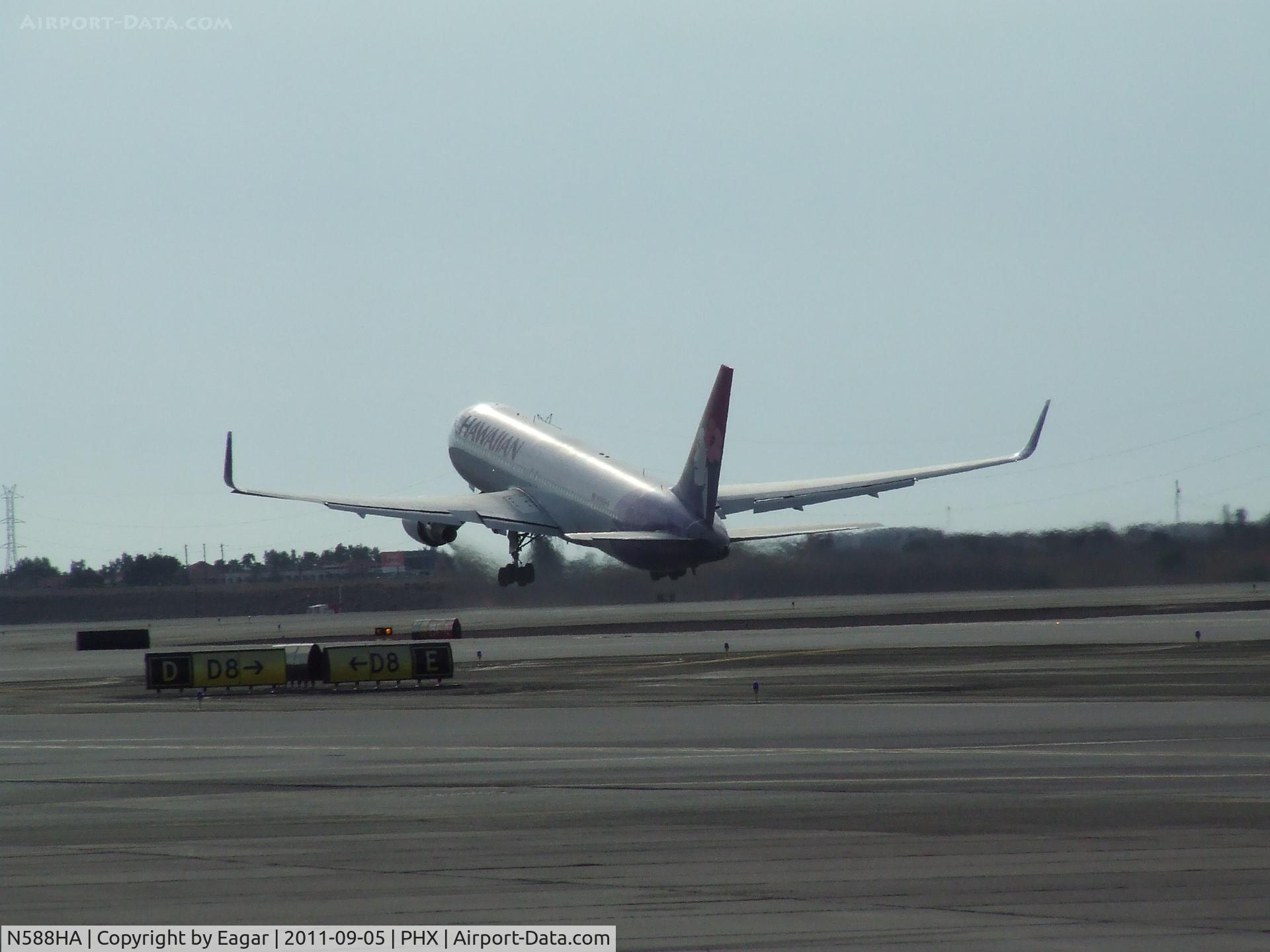 N588HA, 2002 Boeing 767-3CB/ER C/N 33466, Morning departure