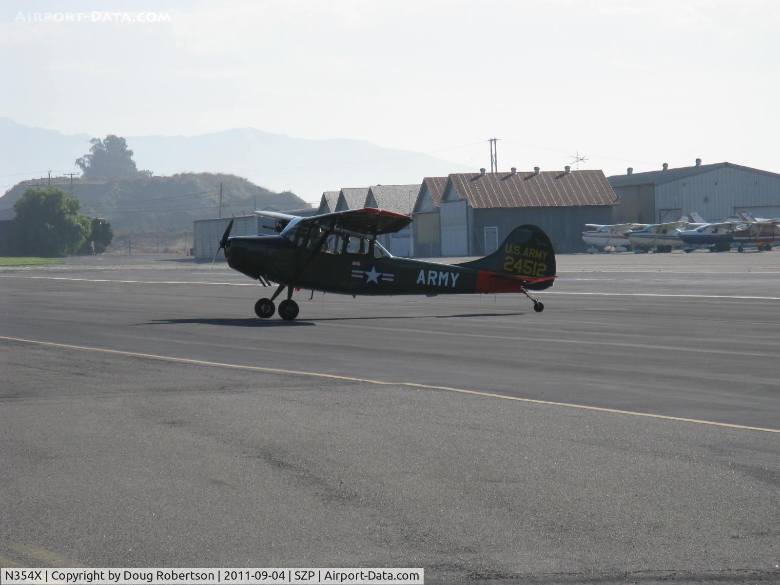 N354X, 1957 Cessna L-19E Bird Dog C/N 24512, 1957 Cessna L-19E BIRD DOG, Continental O-470-11B 213 Hp. NOTE: This aircraft of stunning appearance and authentically marked is 1957 manufacture first FAA-registered in 1983, taxi off the active after STOL landing Rwy 22