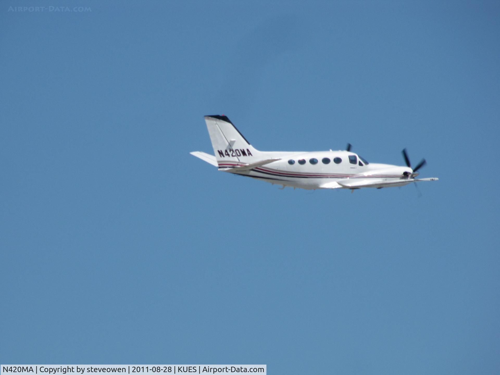 N420MA, 1981 Cessna 425 C/N 425-0116, climbing out of KUES Wings over Waukesha Airshow 2011