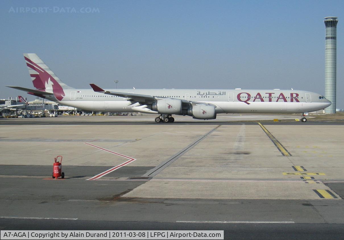 A7-AGA, 2006 Airbus A340-642 C/N 740, The new control tower in use during daylight contributes to the background