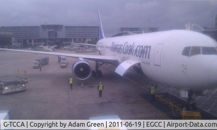 G-TCCA, 1994 Boeing 767-31K C/N 27205, Gate 19 at Manchester Ringway, operating flight TCX2826 to Dalaman