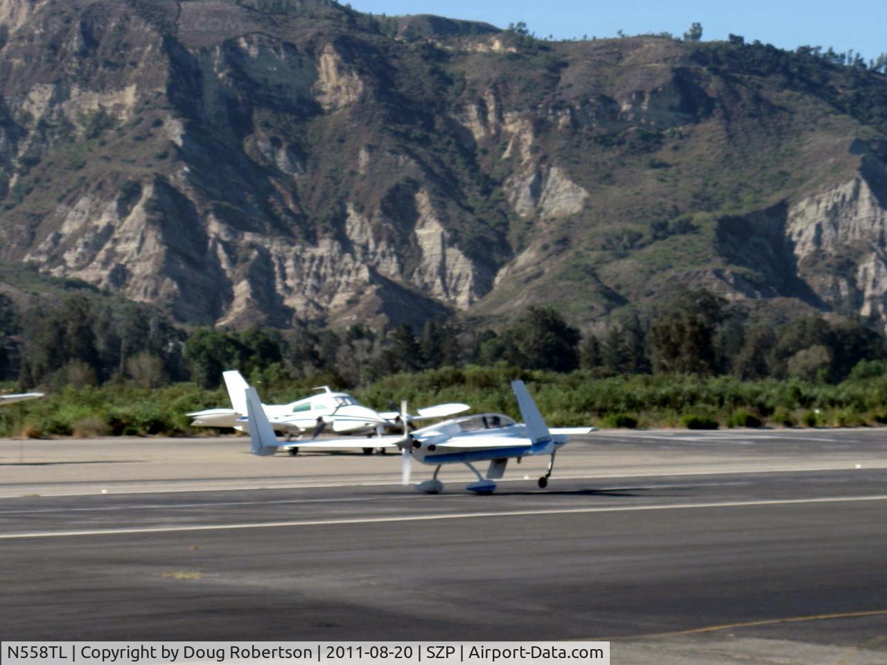 N558TL, 1989 Rutan Long-EZ C/N 1838L, 1989 Lally LONG EZ, Lycoming O-320 pusher, landing roll Rwy 22
