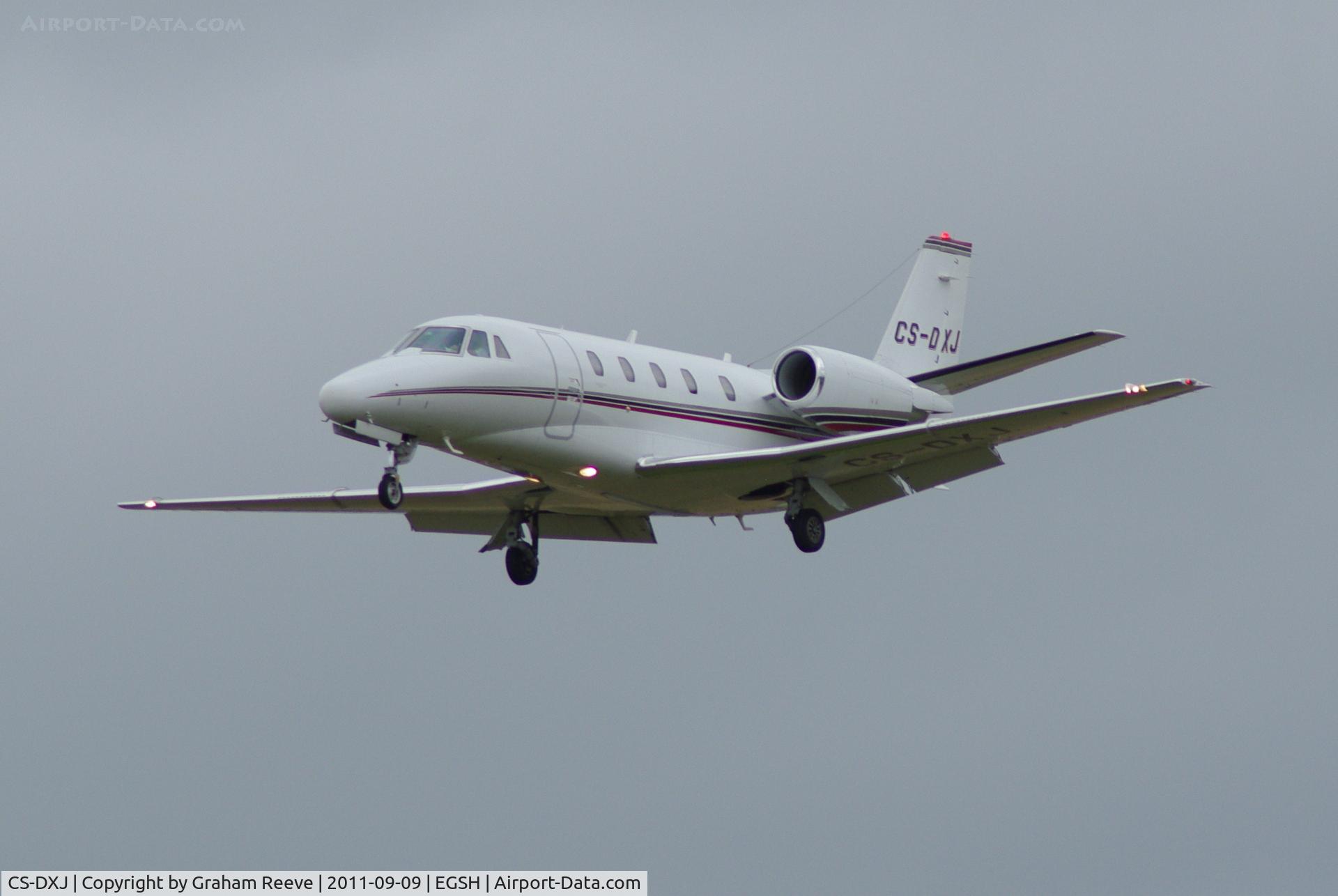 CS-DXJ, 2006 Cessna 560XL Citation Excel C/N 560-5627, About to touch down.