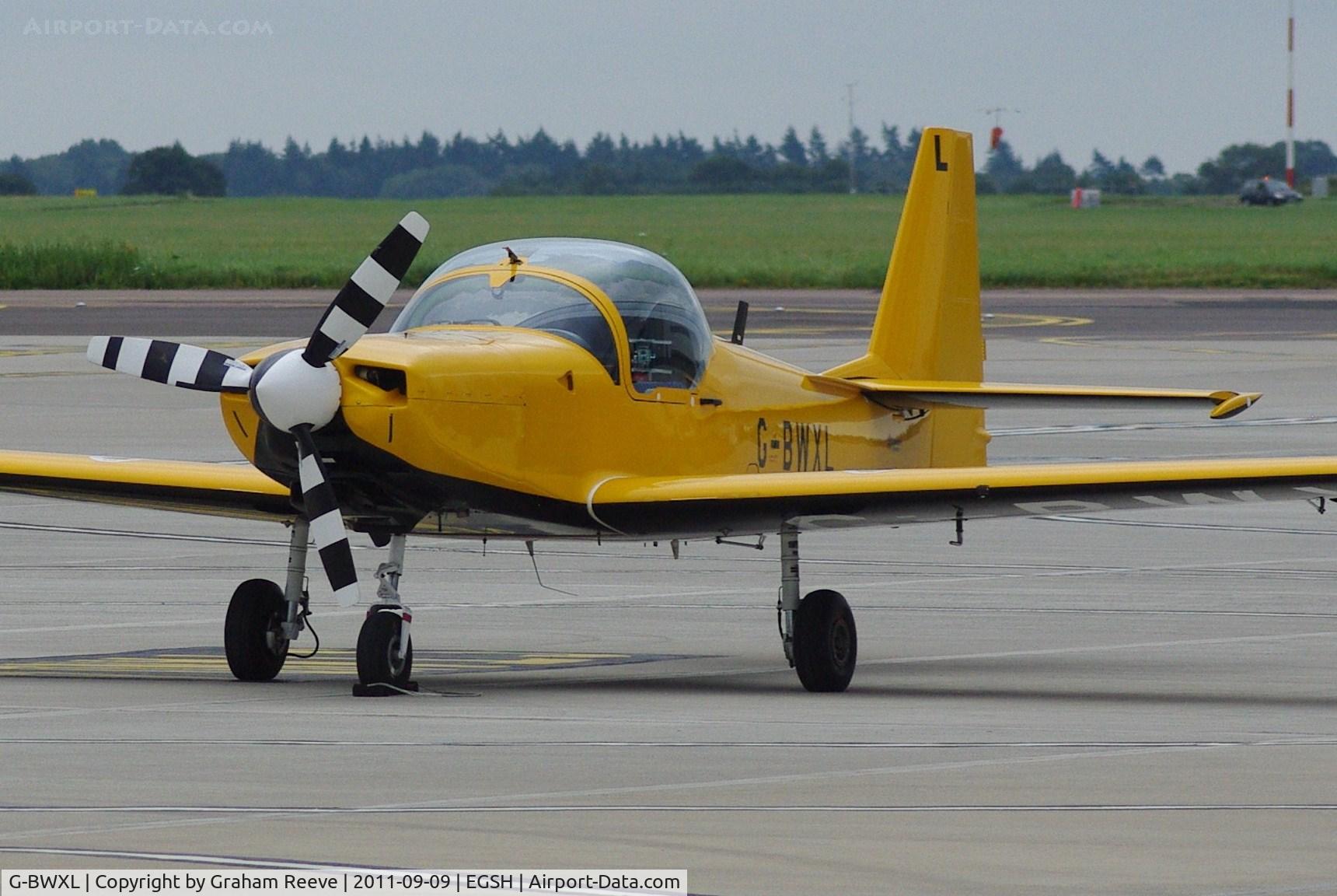 G-BWXL, 1996 Slingsby T-67M-260 Firefly C/N 2247, Parked at Norwich.