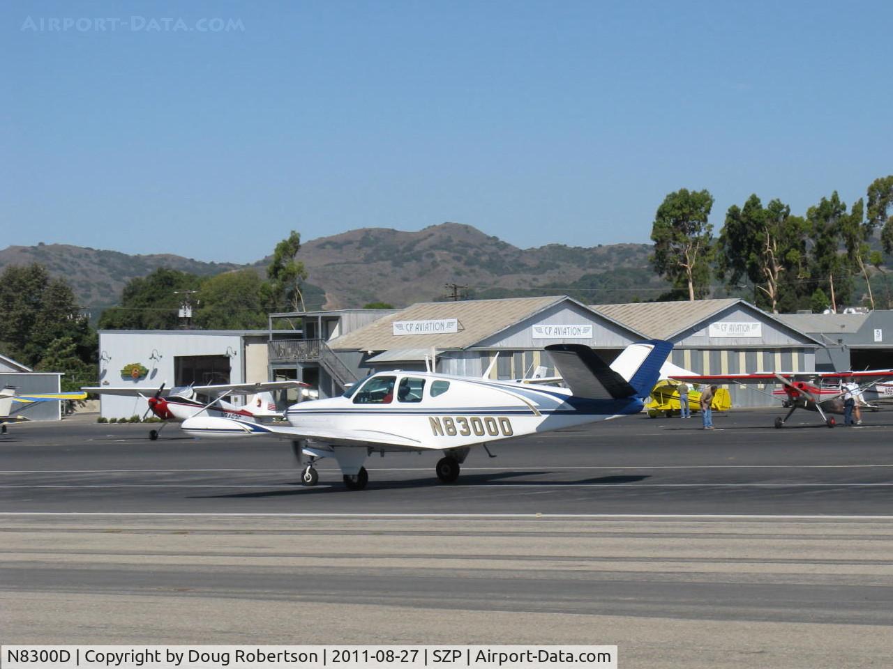 N8300D, 1957 Beech J35 Bonanza C/N D-5394, 1957 Beech J35 BONANZA, Continental FSO-526 270 Hp 6 cylinder upgrade by STC, tip tanks, takeoff roll Rwy 22