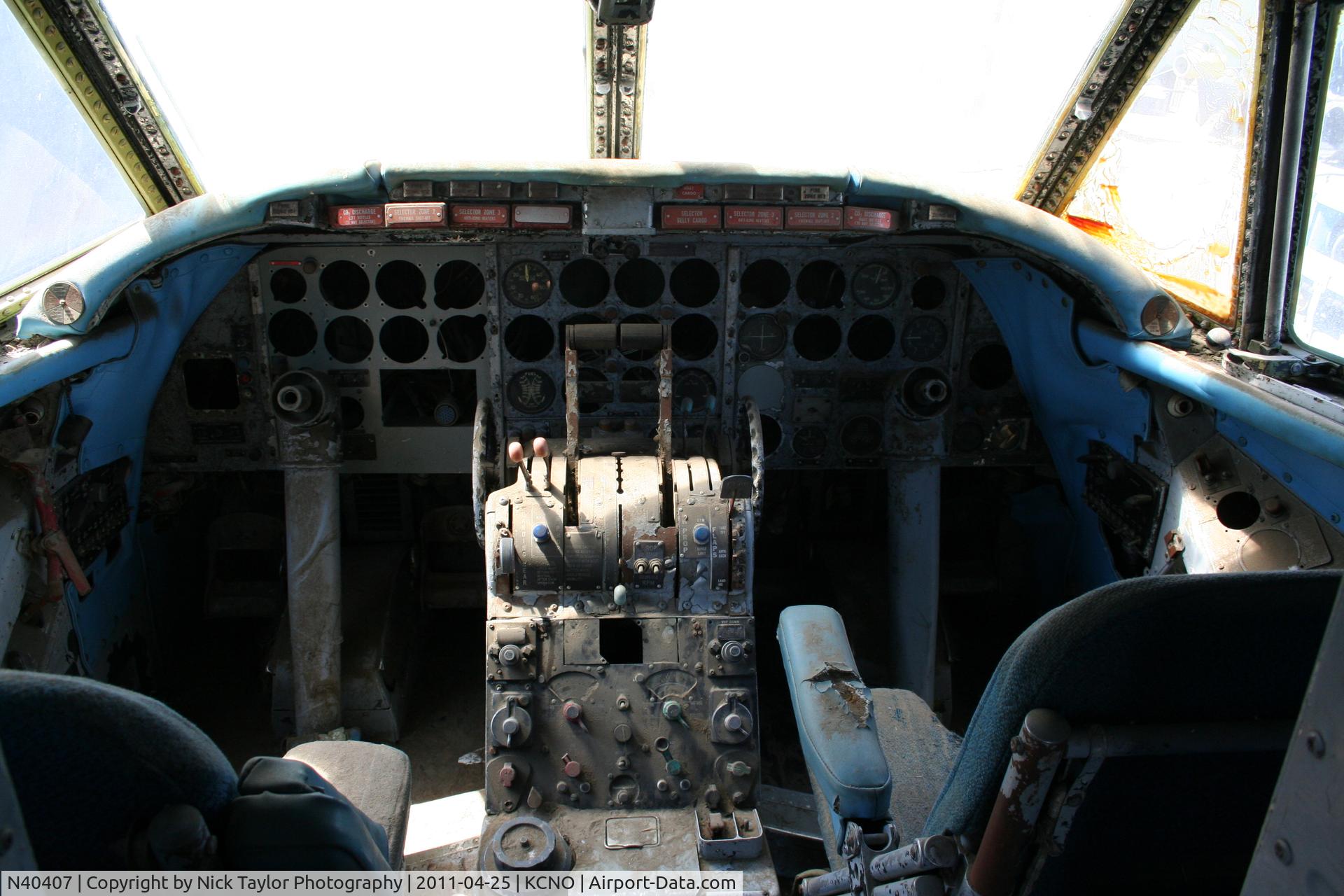 N40407, 1951 Martin 404 C/N 14107, Whats left of the cockpit of this Martin 404. A cat lives in the upholstry. Part of the yanks air museum junkyard.