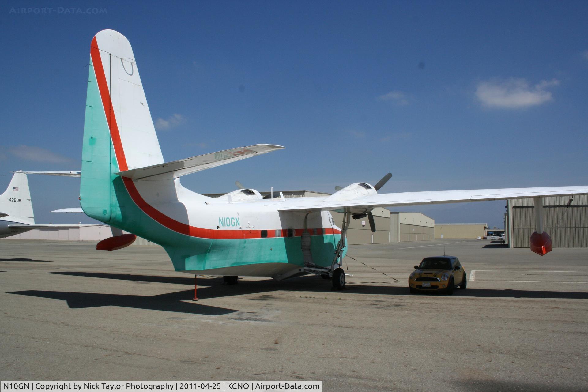 N10GN, 1959 Grumman HU-16D Albatross C/N G445, A mini cooper fits under the wing shadow.