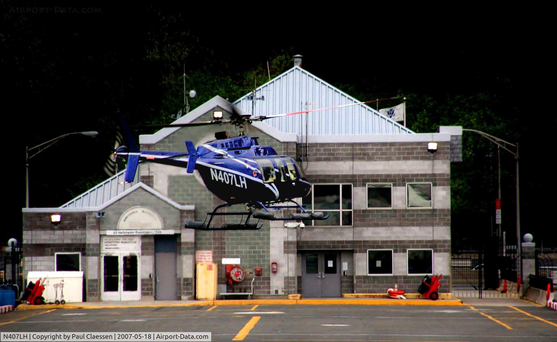 N407LH, 1996 Bell 407 C/N 53063, Picture taken from a tour boat on the East River, NYC.