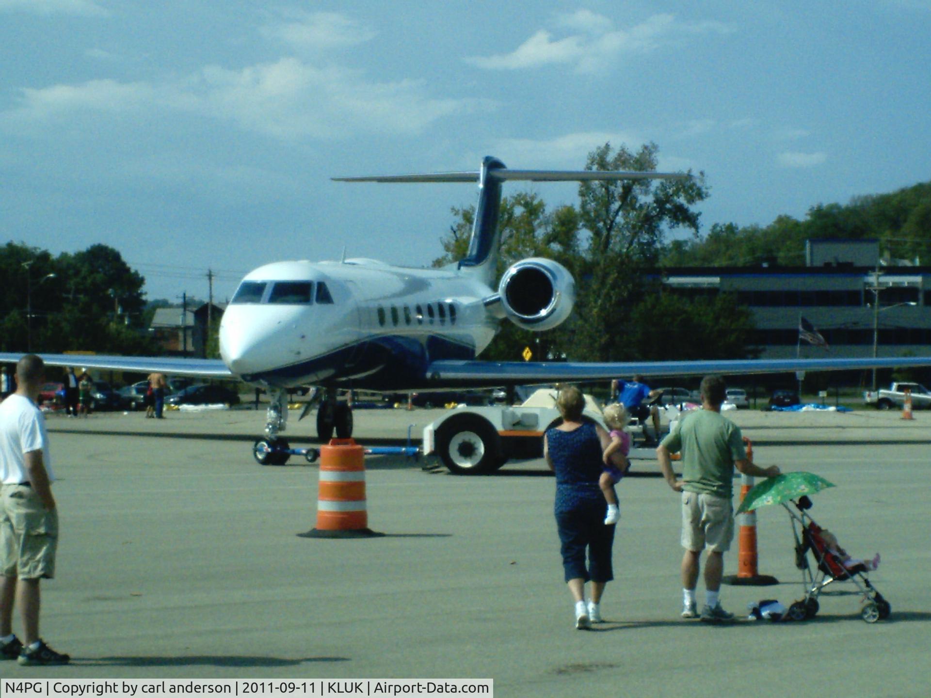 N4PG, 2008 Gulfstream Aerospace GV-SP (G550) C/N 5214, n4pg at kluk airport days being towed to hangar  on 9-11-11