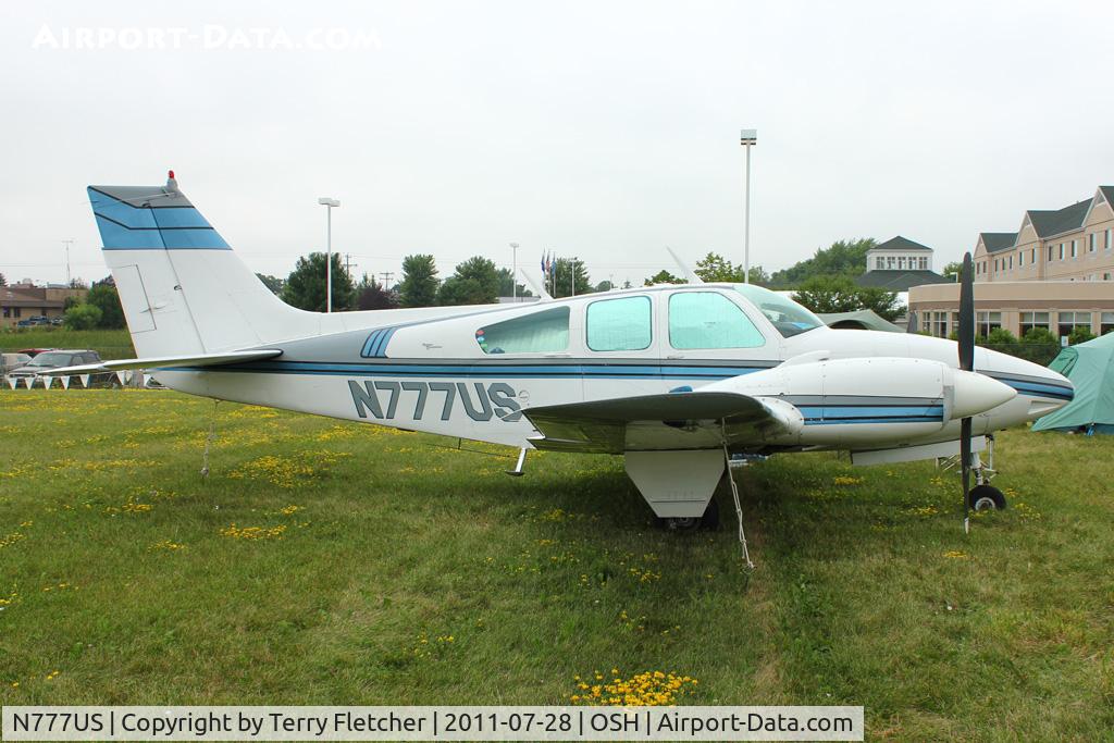 N777US, 1966 Beech C55 Baron (95-C55) C/N TE-182, Aircraft in the camping areas at 2011 Oshkosh