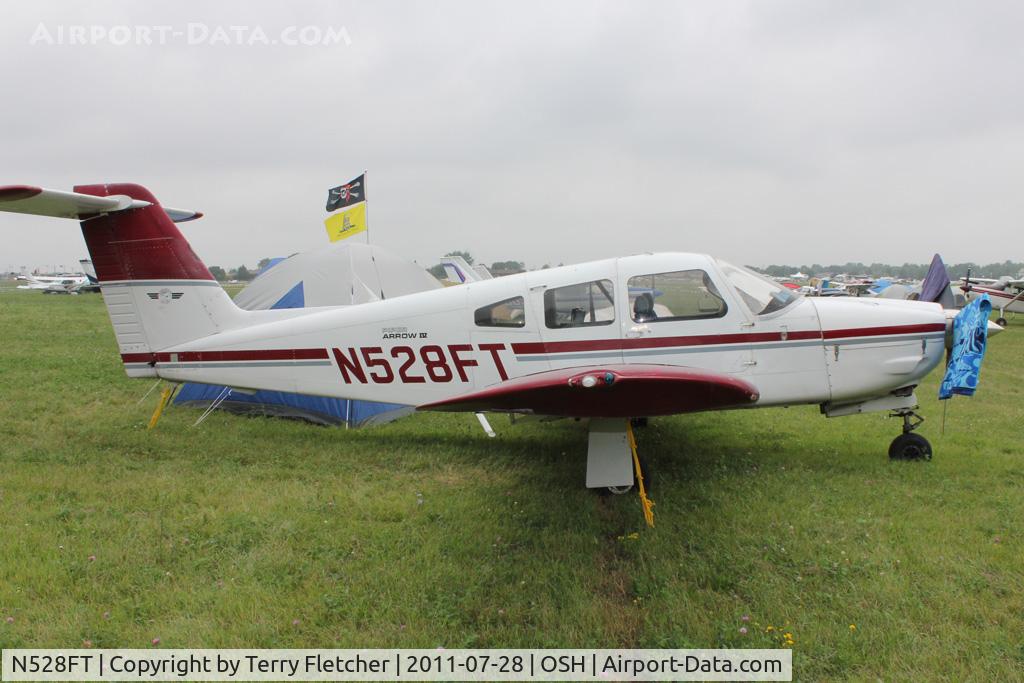 N528FT, 1982 Piper PA-28RT-201 Arrow IV C/N 28R-8218022, Aircraft in the camping areas at 2011 Oshkosh