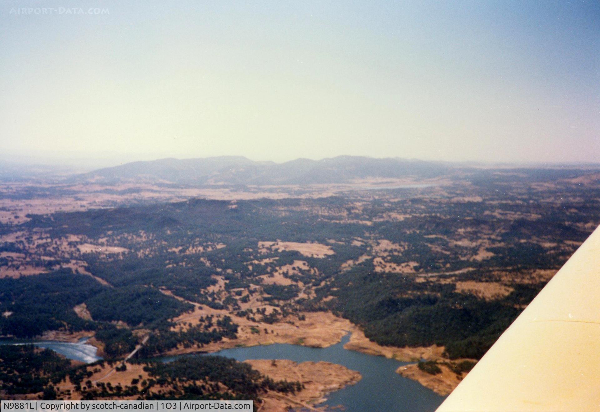 N9881L, 1974 Grumman American AA-1B Trainer C/N AA1B-0481, In Flight over Camanche Reservoir near Campo Seco, CA in 1974 Grumman American Avn. Corp. AA-1B N9881L - July 1989