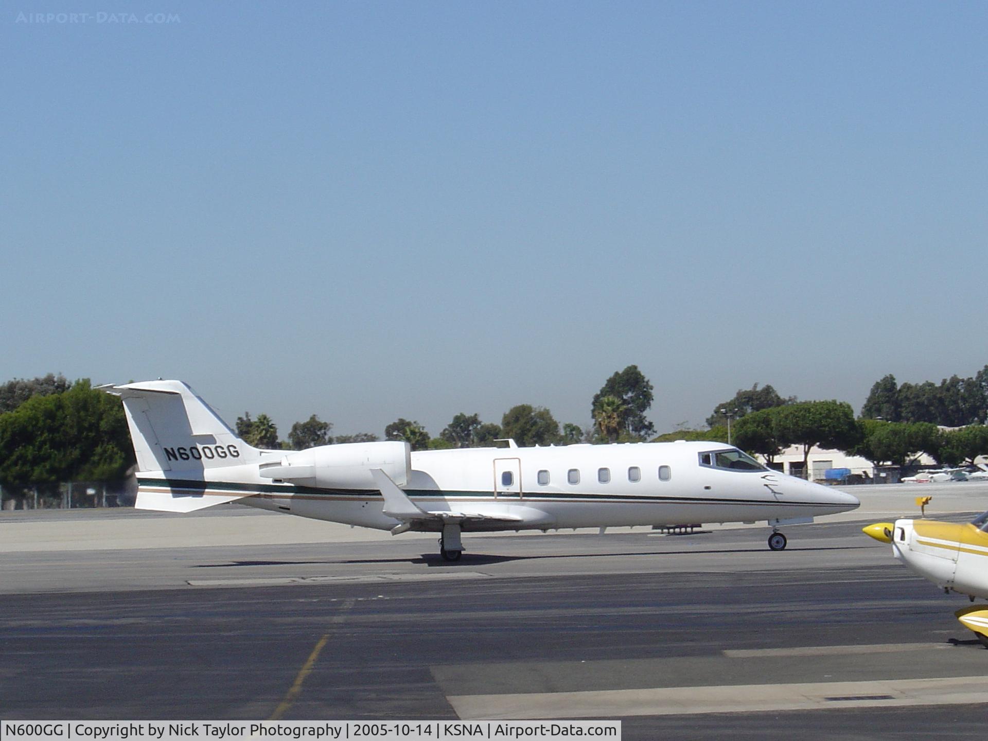 N600GG, 1997 Learjet Inc 60 C/N 115, taxiing to 19R