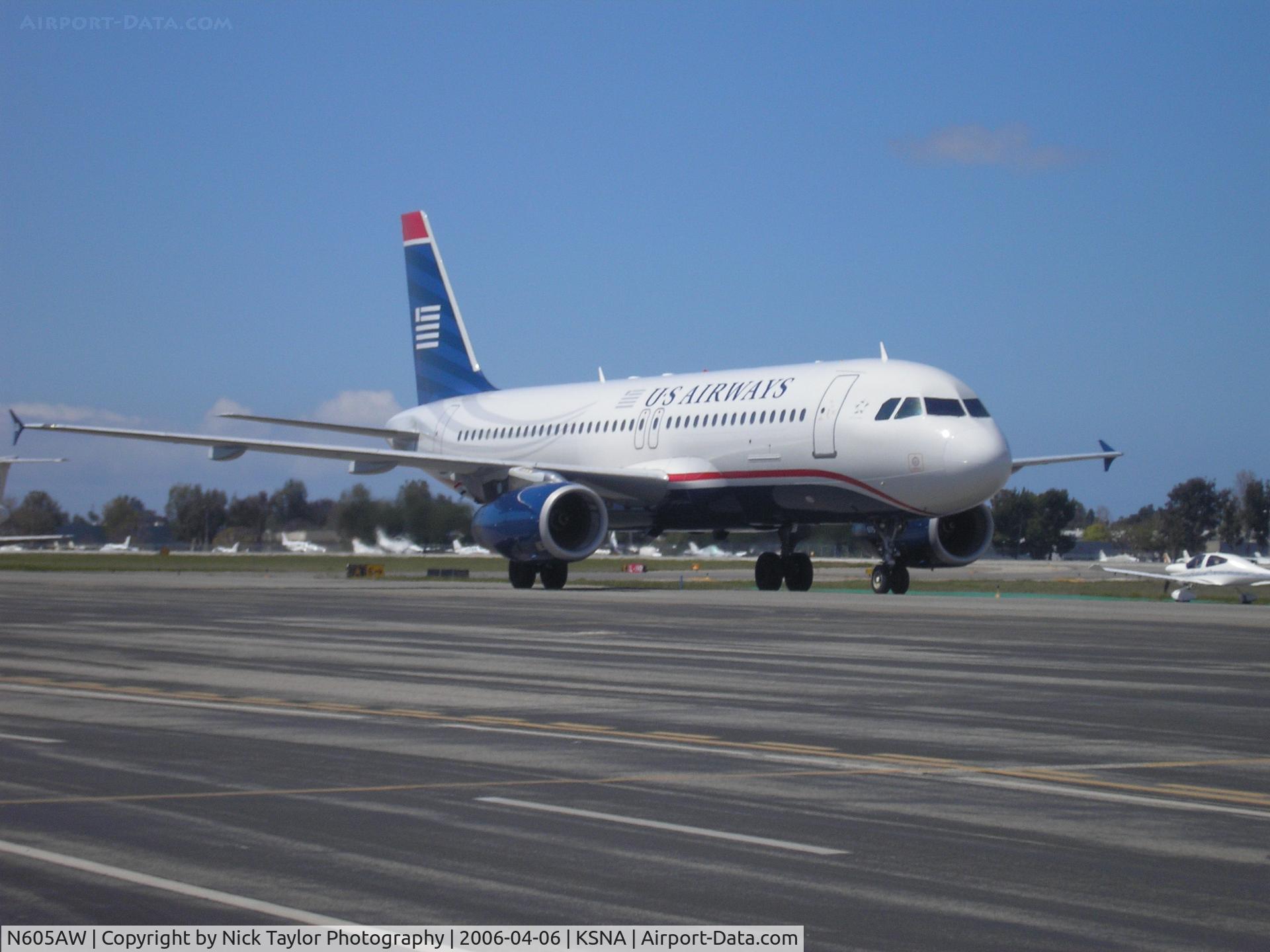 N605AW, 1997 Airbus A320-232 C/N 543, Taxiing to the terminal