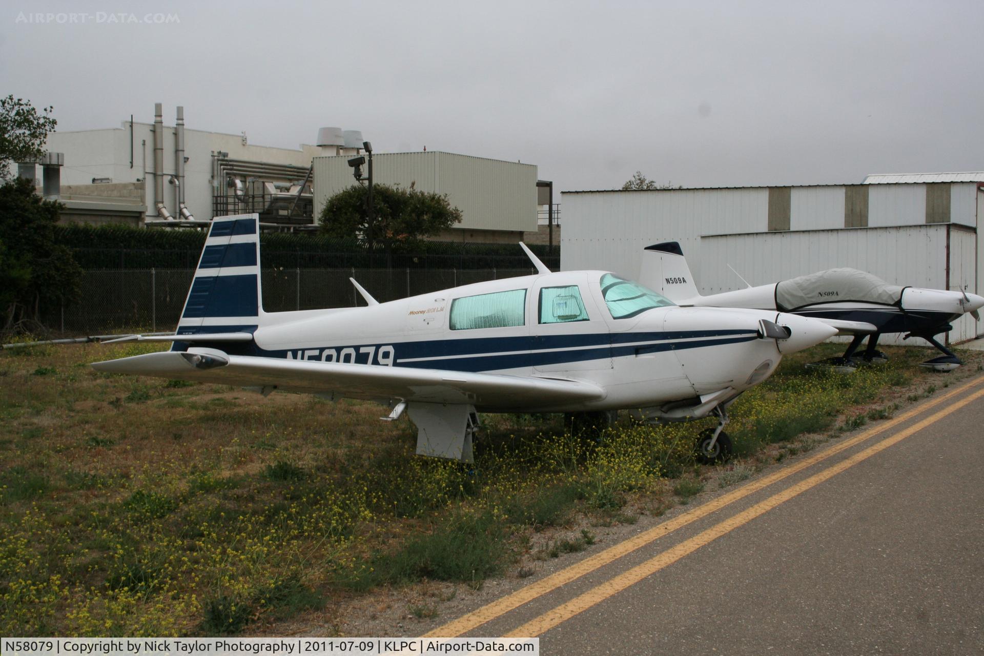 N58079, Mooney M20J 201 C/N 24-1638, Parked on the south side
