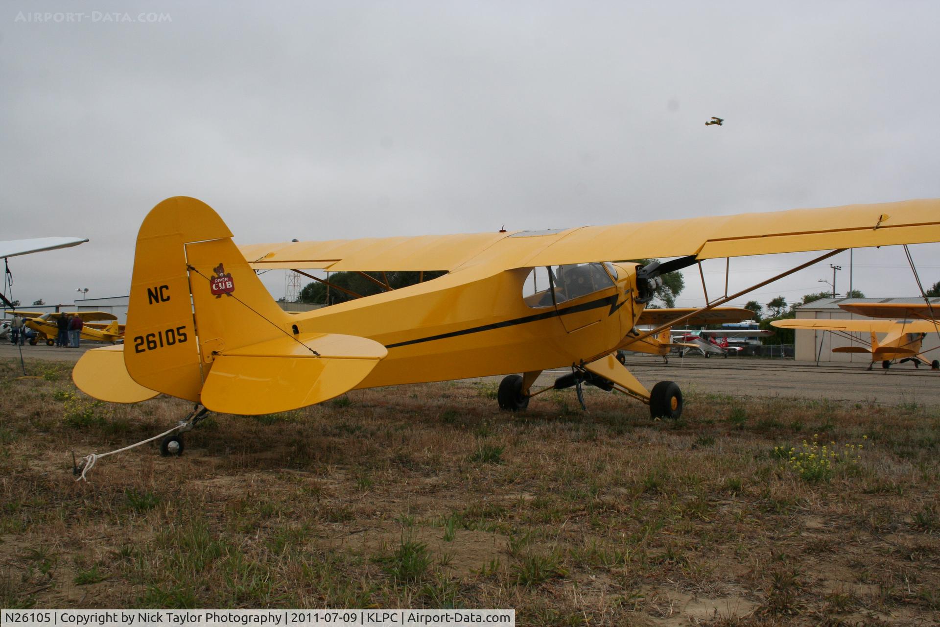 N26105, Piper J3C-65 Cub Cub C/N 4051, Lompoc Piper Cub fly in 2011