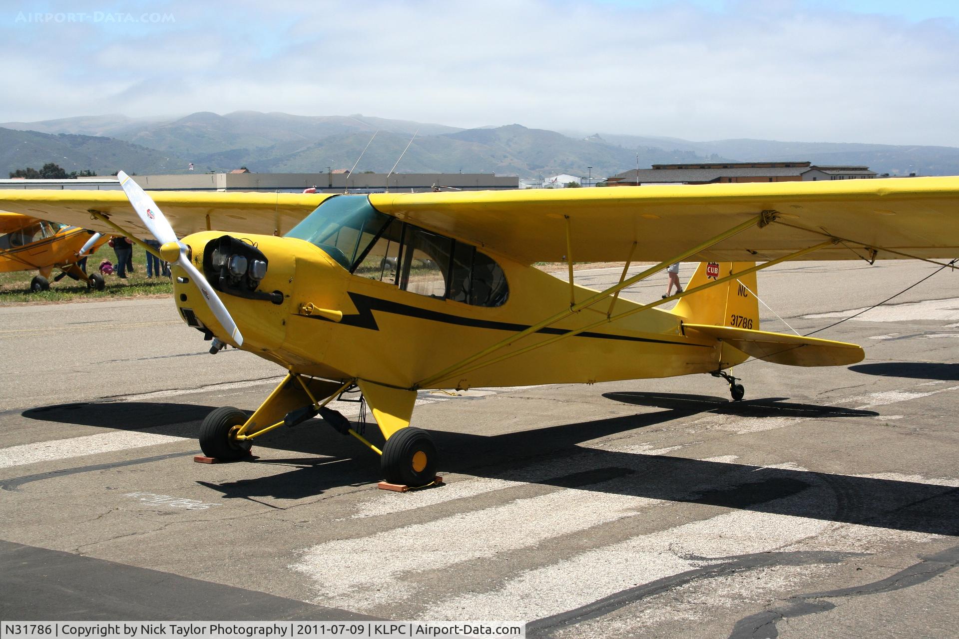 N31786, Piper J3F-65 C/N 5314, Lompoc Piper Cub fly in 2011
