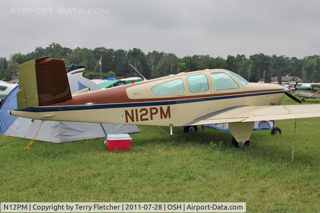 N12PM, 1964 Beech S35 Bonanza C/N D-7514, Aircraft in the camping areas at 2011 Oshkosh