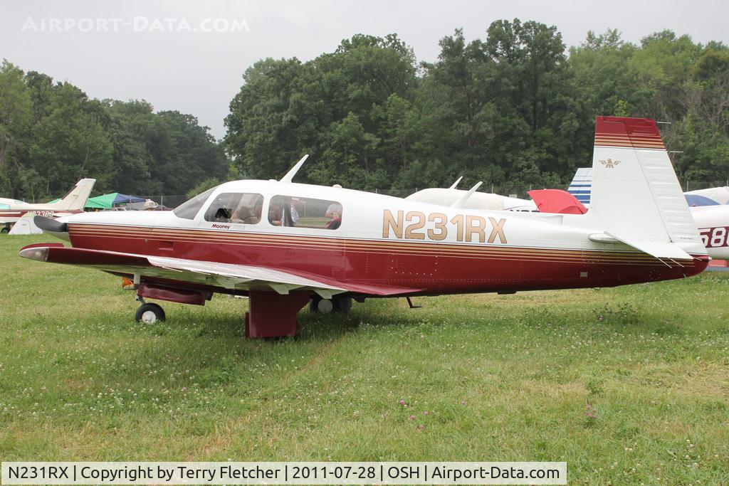 N231RX, 1980 Mooney M20K C/N 25-0305, Aircraft in the camping areas at 2011 Oshkosh