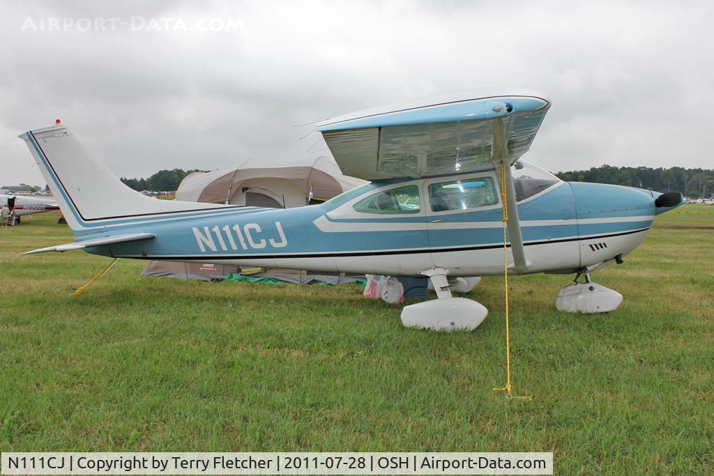 N111CJ, 1973 Cessna 182P Skylane C/N 18262621, Aircraft in the camping areas at 2011 Oshkosh