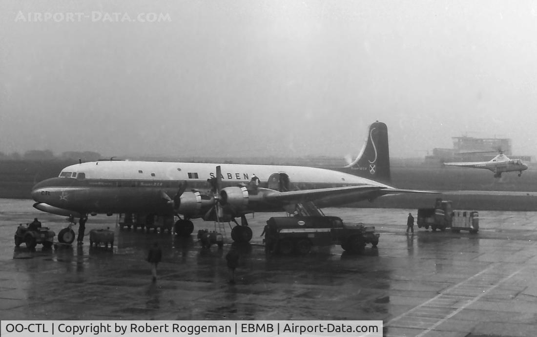 OO-CTL, 1953 Douglas DC-6B C/N 43832, 1958.Sabena see World Expostar on nose.Civil airport Melsbroek.Background Widgeon WS-51 G-ANLW leased by Sabena.See also new building Zaventem EBBR.