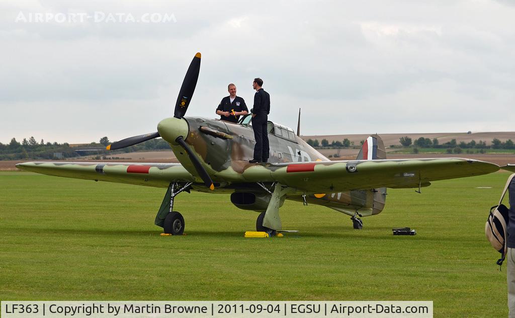 LF363, 1944 Hawker Hurricane IIC C/N 41H/469290, PREPARING FOR A DISPLAY ON A DULL AND RAINY DAY AT DUXFORD.