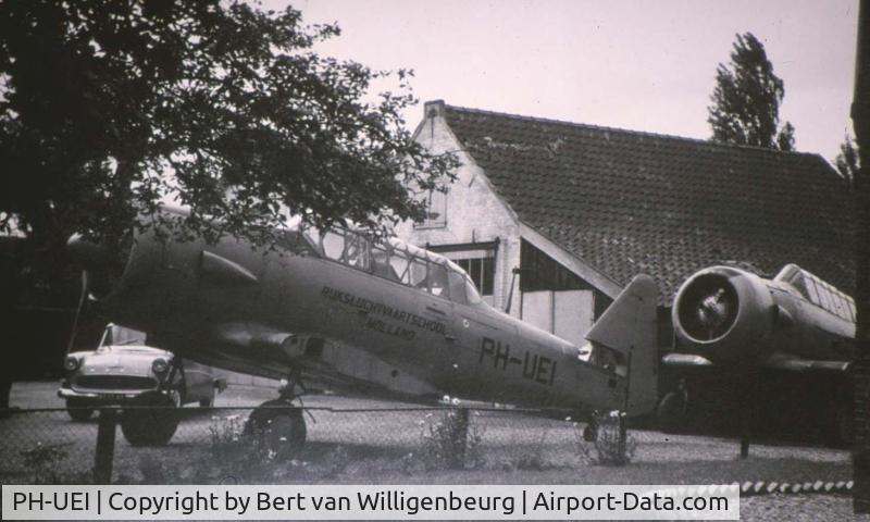 PH-UEI, Noorduyn AT-16 Harvard IIB C/N 14-190, Texan  by the house off Joop Daams  Nieuw-Loosdrecht in the 1960.