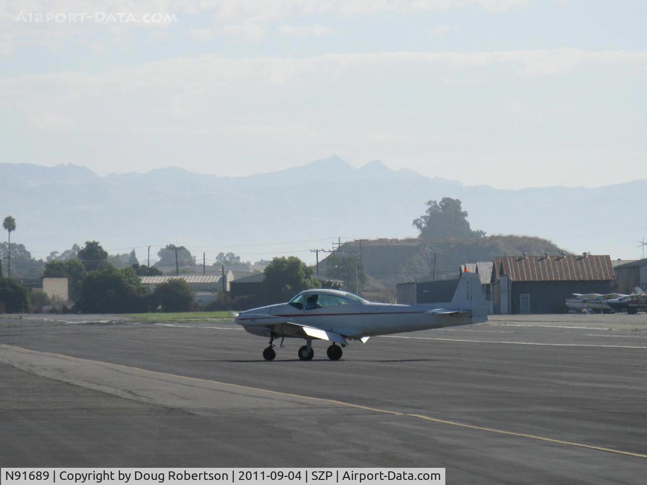 N91689, 1946 North American Navion (NA-145) C/N NAV-4-431, 1946 North American NAVION, Continental E-225 upgrade, many mods, taxi off the active