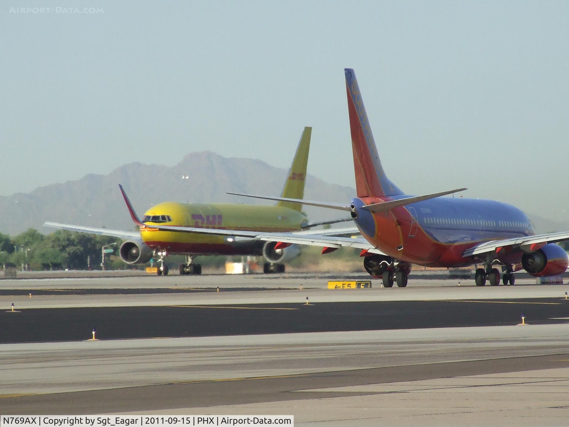 N769AX, 1983 Boeing 767-281 C/N 22787, DHL cranking it up with Southwest waiting its turn