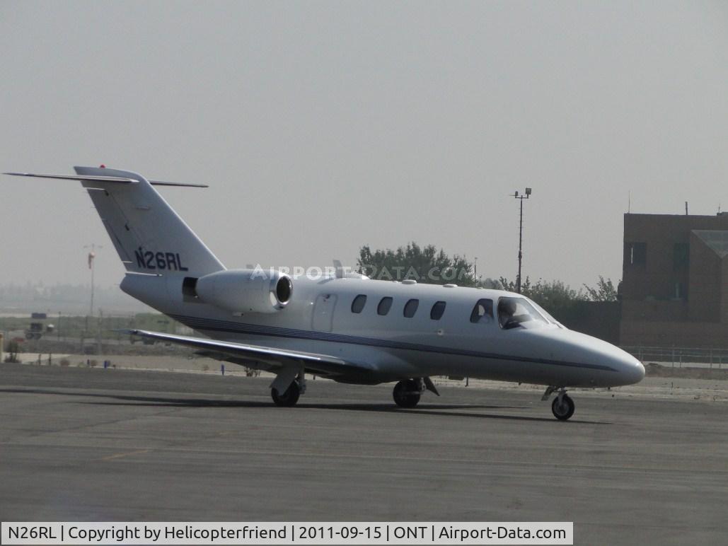N26RL, 1997 Cessna 525 CitationJet CJ1 C/N 525-0207, Taxiing into a parking area south side of airport