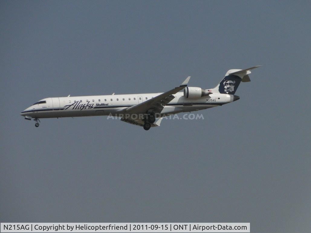 N215AG, 2000 Bombardier CRJ-701 (CL-600-2C10) Regional Jet C/N 10009, On final for runway 26L
