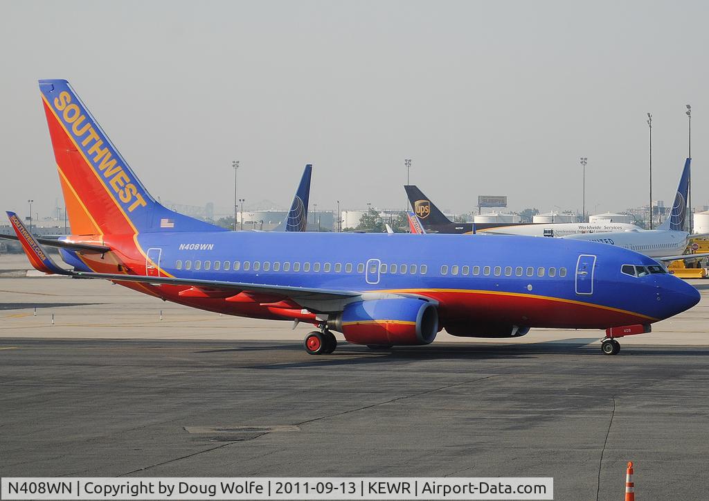 N408WN, 2001 Boeing 737-7H4 C/N 27895, Heading for Terminal A at Newark Liberty.