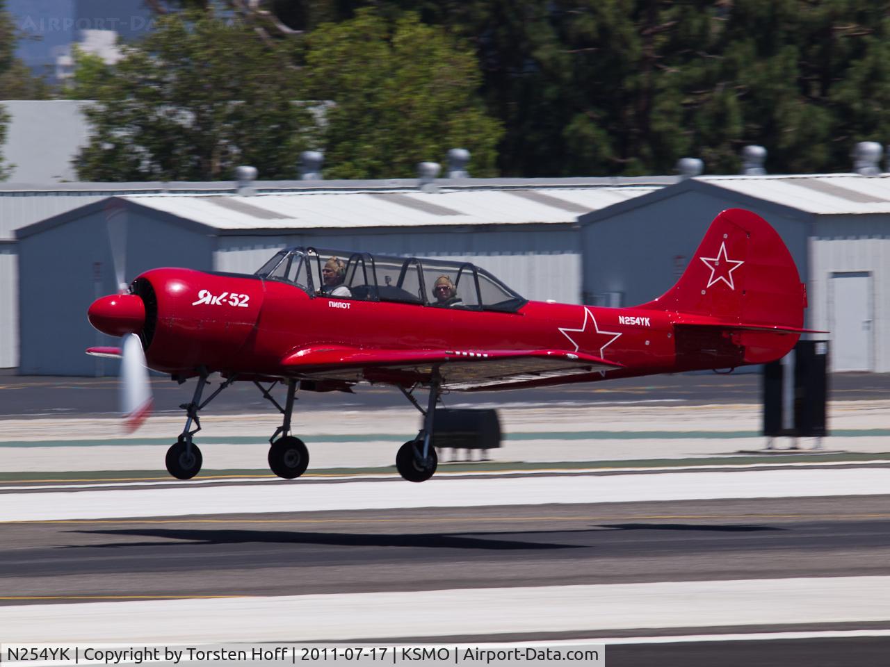 N254YK, 1985 Yakovlev Yak-52 C/N 855410, N254YK departing from RWY 21