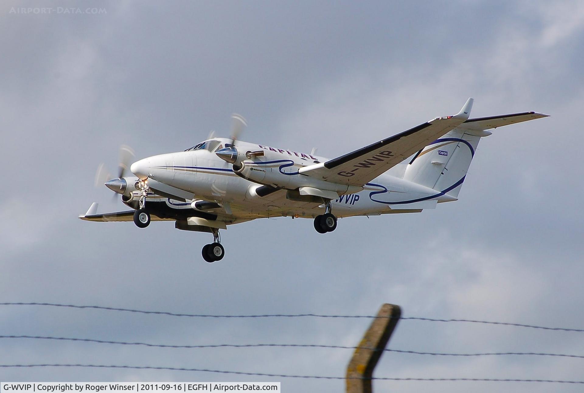 G-WVIP, 1980 Beech 200 Super King Air C/N BB-625, Over the fence. Capital Air Charter's Super King Air departing.