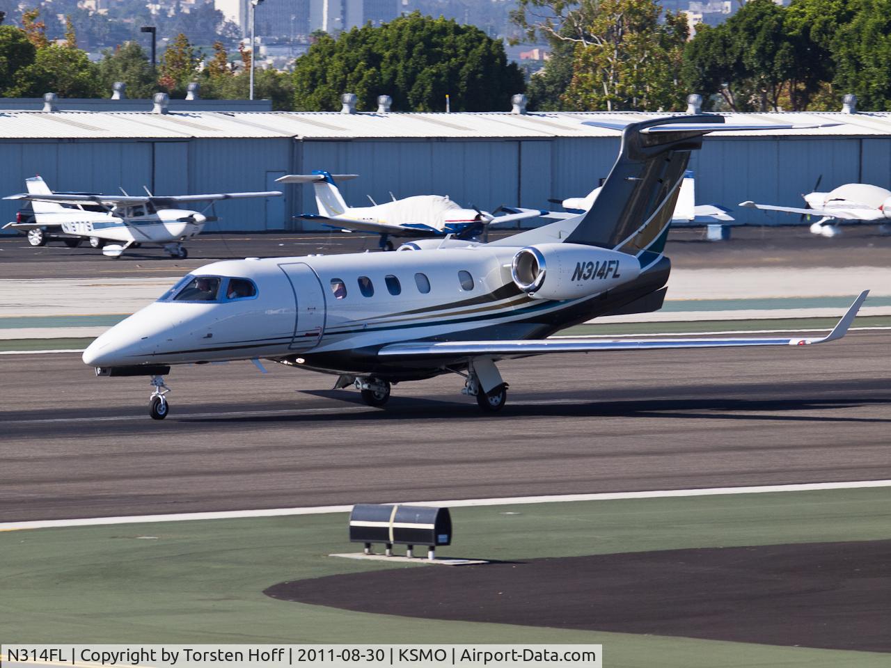 N314FL, 2011 Embraer EMB-505 Phenom 300 C/N 50500050, N314FL departing from RWY 21
