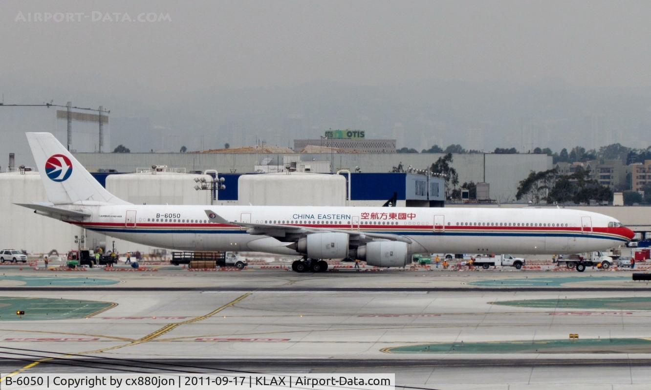 B-6050, 2002 Airbus A340-642 C/N 468, CES A340-600 taxiing to gate