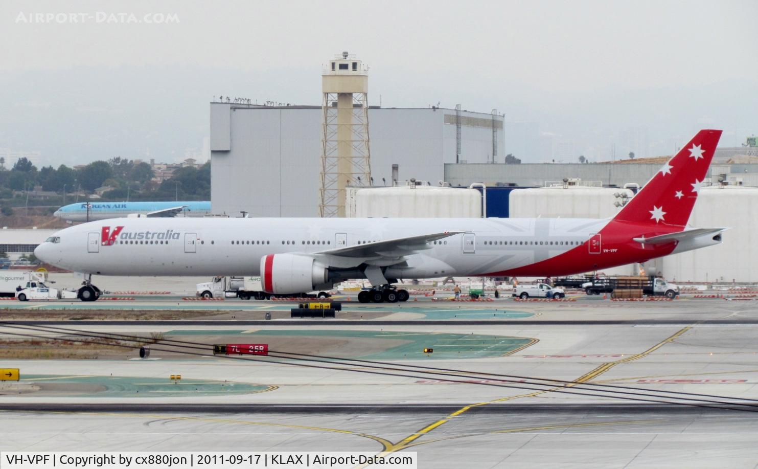 VH-VPF, 2009 Boeing 777-3ZG/ER C/N 37940, One of two V Australia's 777s taxiing to parking area