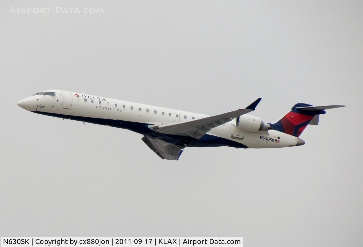 N630SK, 2011 Bombardier CRJ-700 (CL-600-2C10) Regional Jet C/N 10328, Delta Connection CRJ-900 rockets into the sky