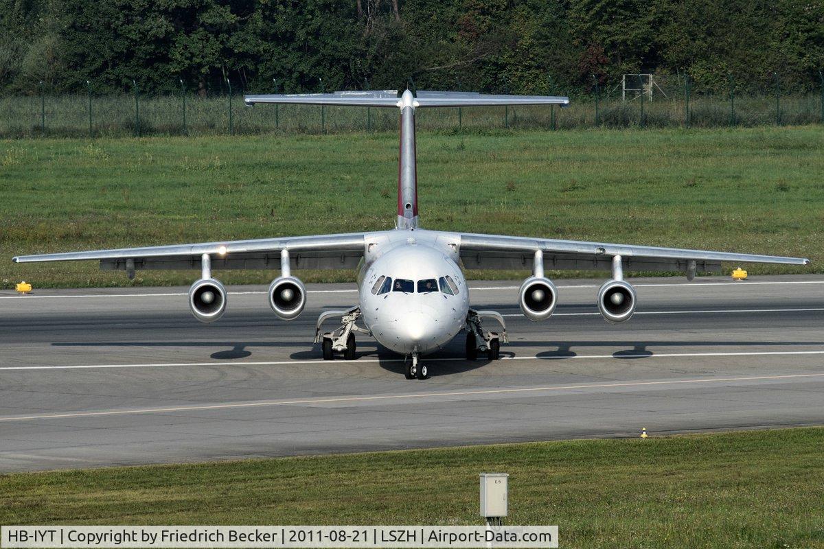HB-IYT, 2000 British Aerospace Avro 146-RJ100 C/N E3380, vacating the runway